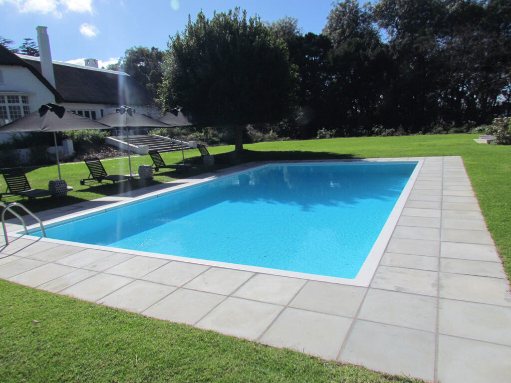 pool paving Zimbabwe, pool surround paving Bulawayo, non-slip pool paving Zimbabwe, patio paving Zimbabwe, pool deck pavers Zimbabwe, best paving for swimming pool Zimbabwe, heat reflective pool paving, travertine pool paving Zimbabwe, slate pool surround paving, pool coping and paving Bulawayo, luxury pool paving Zimbabwe, swimming pool paving cost Zimbabwe, pool paving installers Bulawayo, patio and pool paving ideas Zimbabwe, pool paving drainage Zimbabwe, cool pool deck paving for hot weather